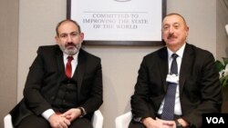 Ermenistan Başbakanı Nikol Paşinyan ve Azerbaycan Cumhurbaşkanı İlham Aliyev, Davos'taki Dünya Ekonomik Forumu'nda (22 Ocak 2019)